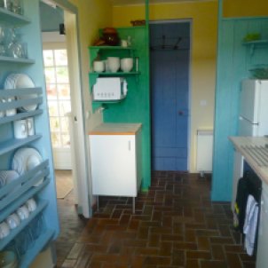 8) Kitchen. View towards shower room and laundry (washing machine/dryer)