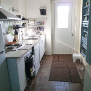 8) Kitchen. View towards the front door. Fridge/freezer, Dishwasher